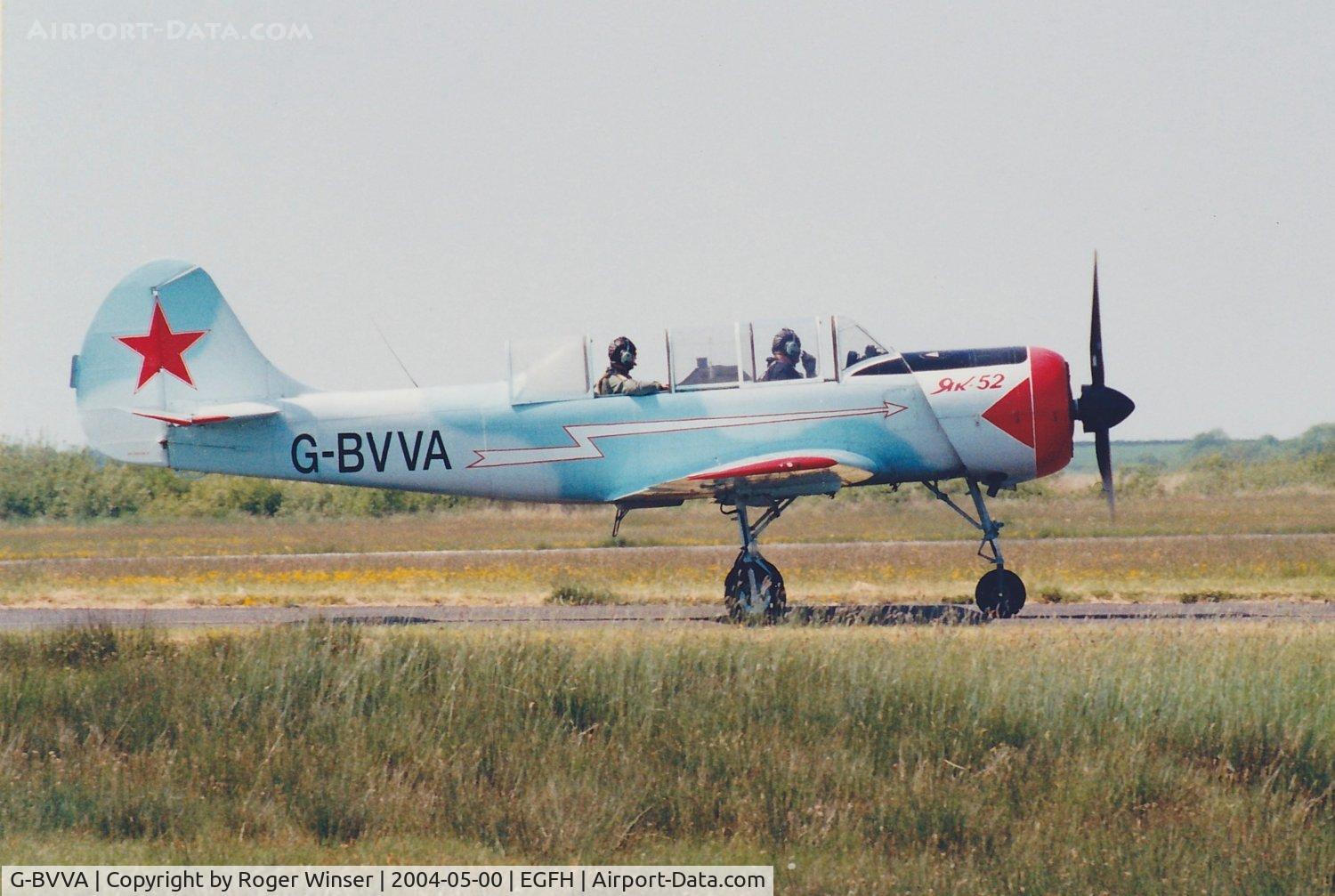 G-BVVA, 1987 Bacau Yak-52 C/N 877610, Based at Swansea Airport. In light camouflage scheme mid-May 2004.