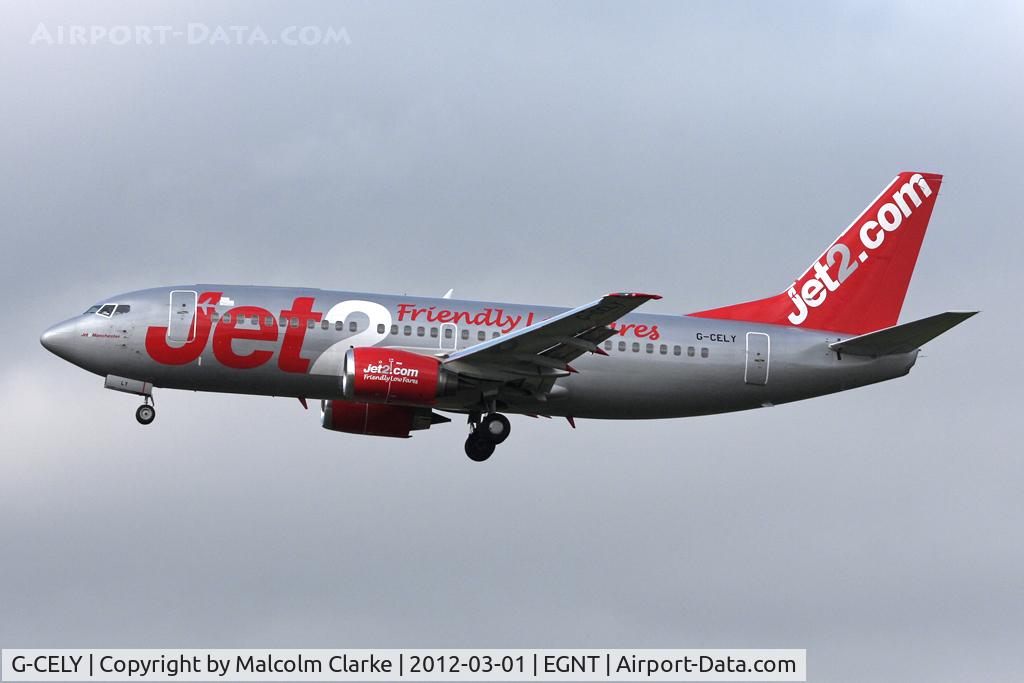 G-CELY, 1986 Boeing 737-377(QC) C/N 23662, Boeing 737-377 on approach to Runway 25 at Newcastle Airport, March 2012.