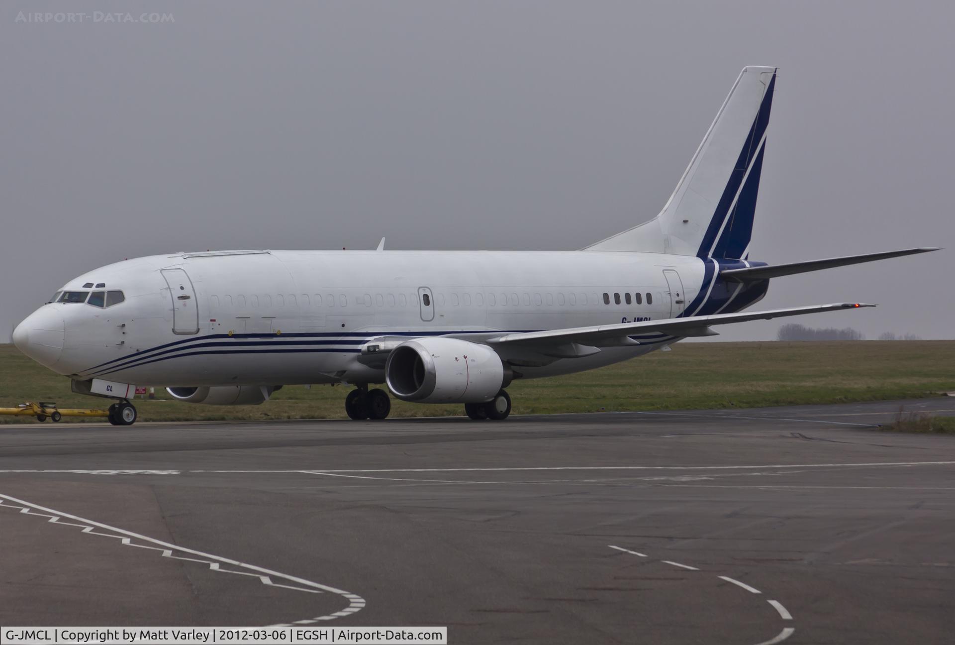 G-JMCL, 1988 Boeing 737-322F C/N 23951, Being towed to the north side for engine runs.