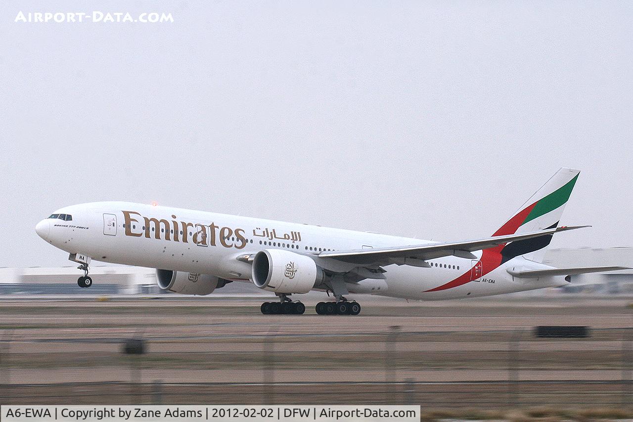 A6-EWA, 2007 Boeing 777-21H/LR C/N 35572, Emirates Airlines departing on their inaugural flight from DFW Airport.