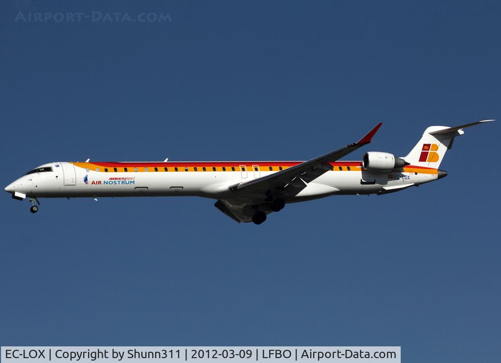 EC-LOX, 2011 Bombardier CRJ-1000ER NG (CL-600-2E25) C/N 19020, Landing rwy 32L