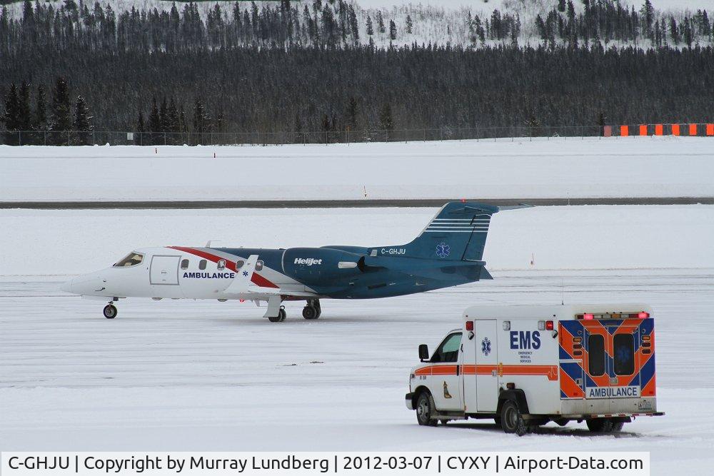 C-GHJU, 1996 Learjet 31A C/N 31-120, Taxiing for takeoff after loading a medivac passenger from the vehicle-ambulance.