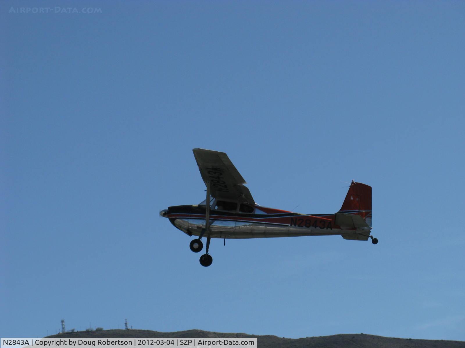 N2843A, 1953 Cessna 180 C/N 30043, 1953 Cessna 180, Continental O-470 225 Hp, the 180 would not be called the SKYWAGON until the 1969 model year, takeoff climb Rwy 04