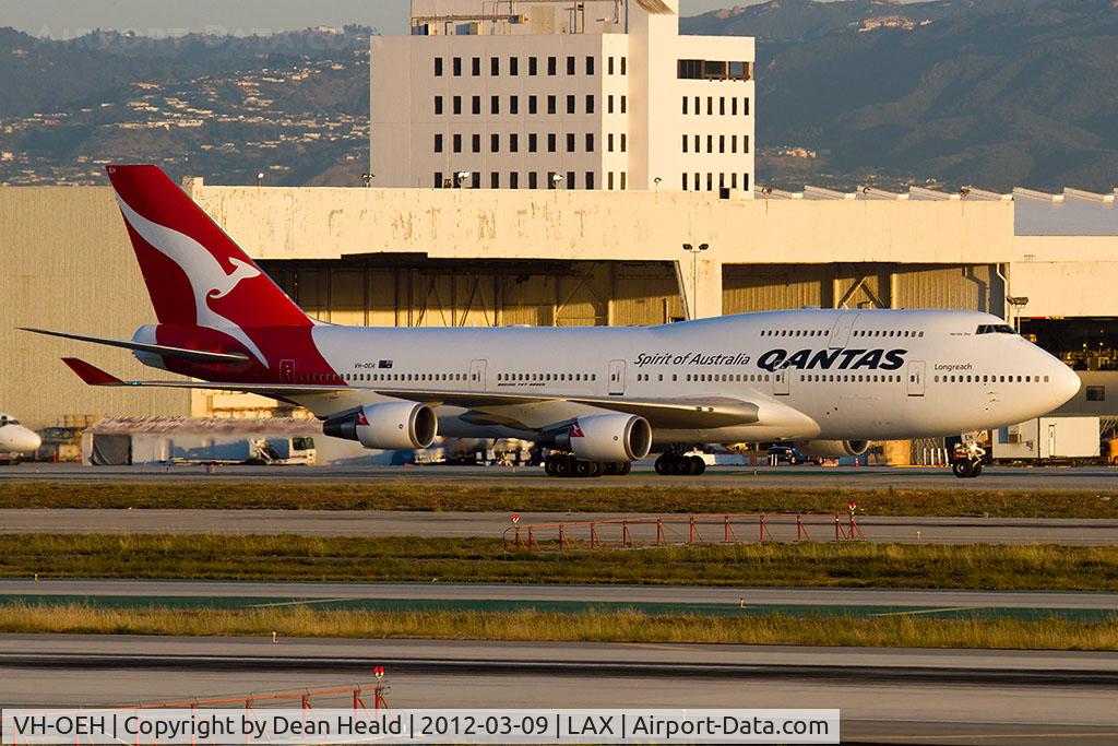 VH-OEH, 2003 Boeing 747-438/ER C/N 32912, Qantas VH-OEH (FLT QFA15) taxiing to Gate 86 after arrival on the north complex from Brisbane (YBBN/BNE) in the early morning.