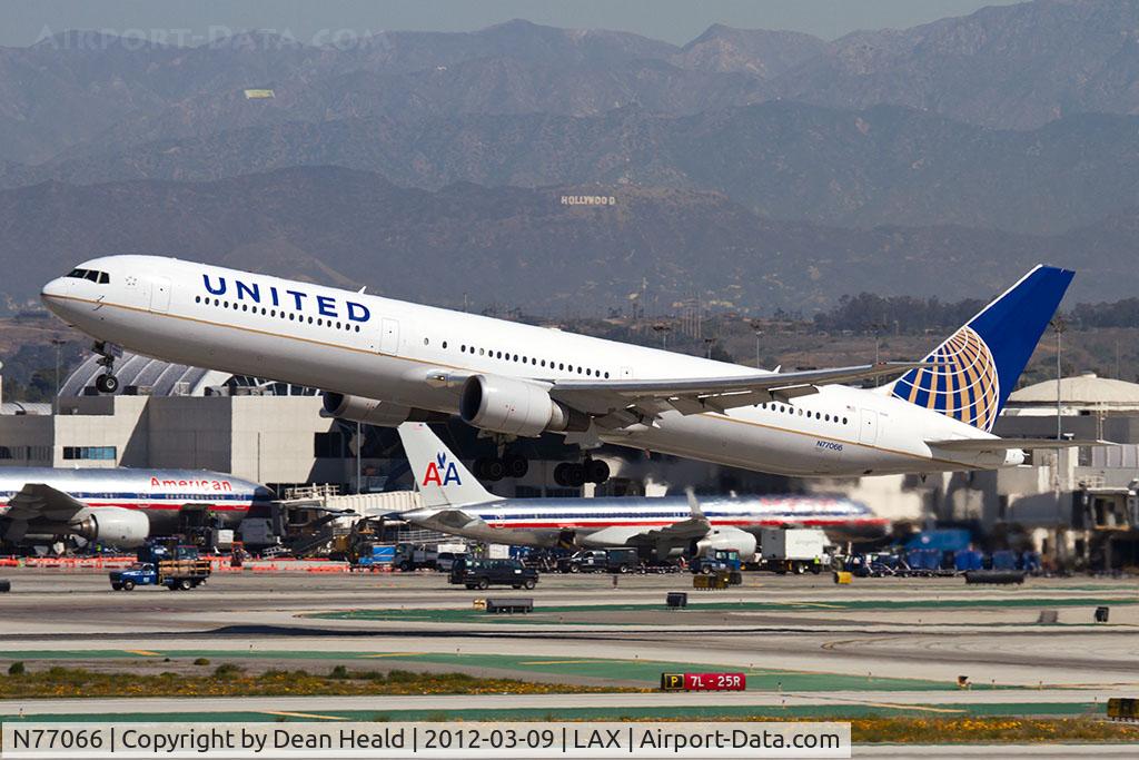 N77066, 2002 Boeing 767-424/ER C/N 29461, United Airlines N77066 (FLT UAL1152) departing RWY 25R en route to Honolulu Int'l (PHNL). This aircraft had several Iwo Jima veterans onboard that were on their way to an Iwo Jima Association of America Reunion of Honor Tour.