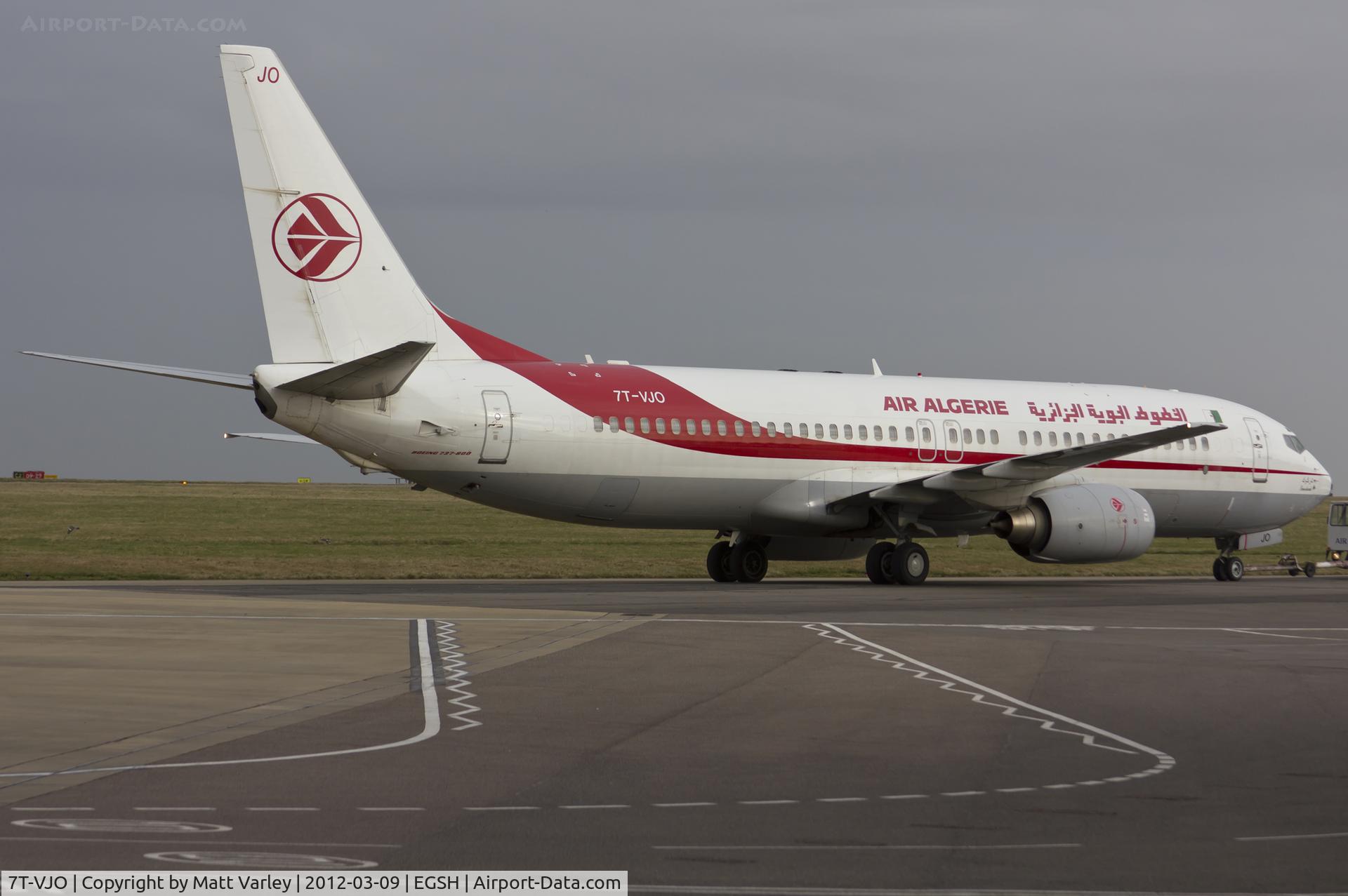 7T-VJO, 2001 Boeing 737-8D6 C/N 30207, Being towed to the Air Livery hanagar for spray.