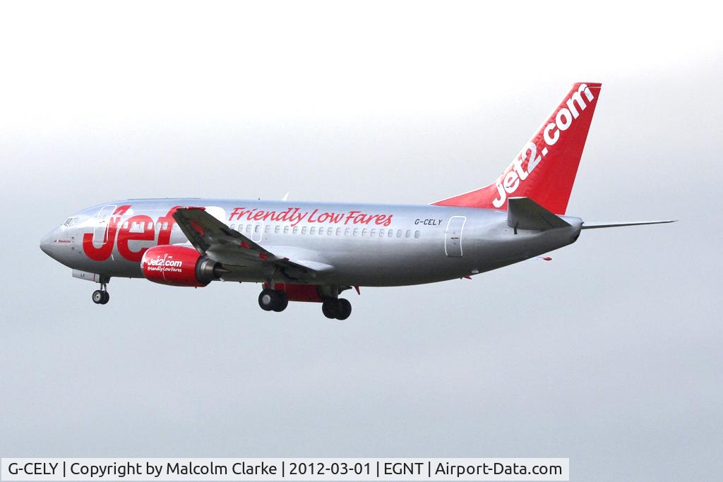 G-CELY, 1986 Boeing 737-377(QC) C/N 23662, Boeing 737-377 on approach to Runway 25 at Newcastle Airport, March 2012.