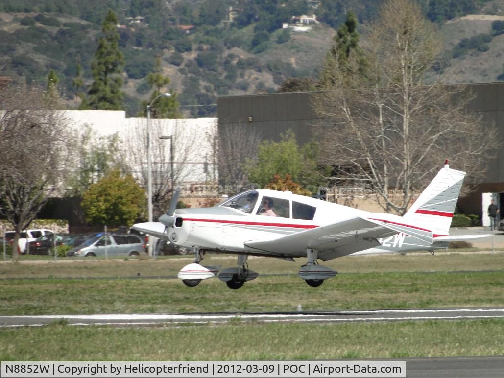 N8852W, 1964 Piper PA-28-235 C/N 28-10405, Touching down on runway 26L
