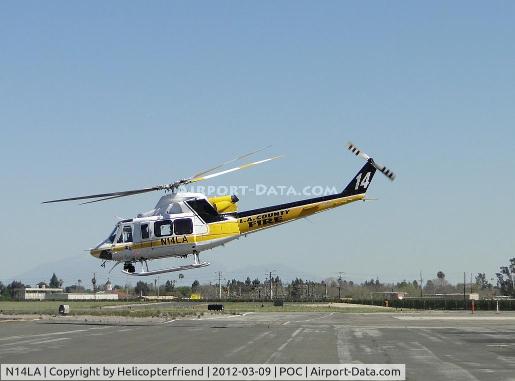 N14LA, 2005 Bell 412EP C/N 36393, Fueling hose & ground removed, ship is up and heading north towards the mountains
