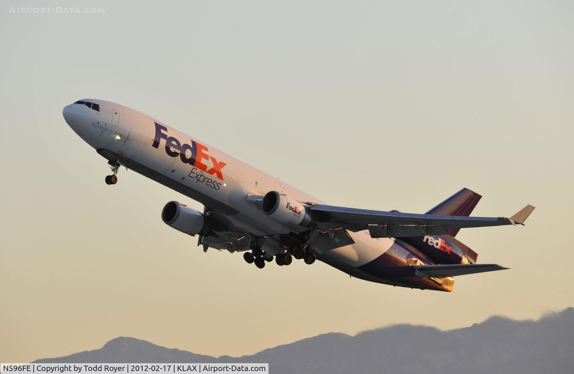 N596FE, 1993 McDonnell Douglas MD-11F C/N 48554, Departing LAX at first light