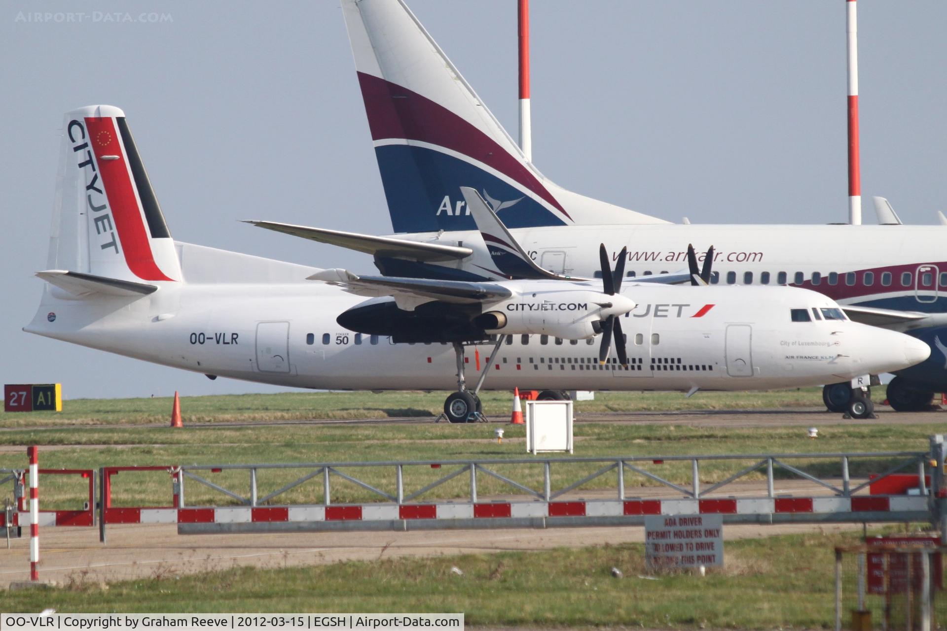 OO-VLR, 1988 Fokker 50 C/N 20121, Parked at Norwich.