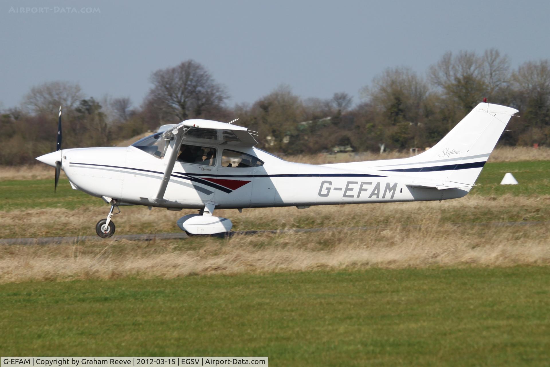 G-EFAM, 1999 Cessna 182S Skylane C/N 18280442, Taking off.