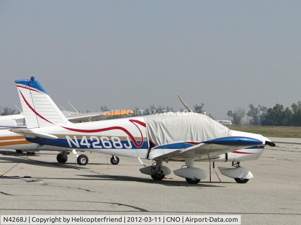 N4268J, 1967 Piper PA-28-140 C/N 28-22626, Covered up, tied down and parked south and east of the control tower