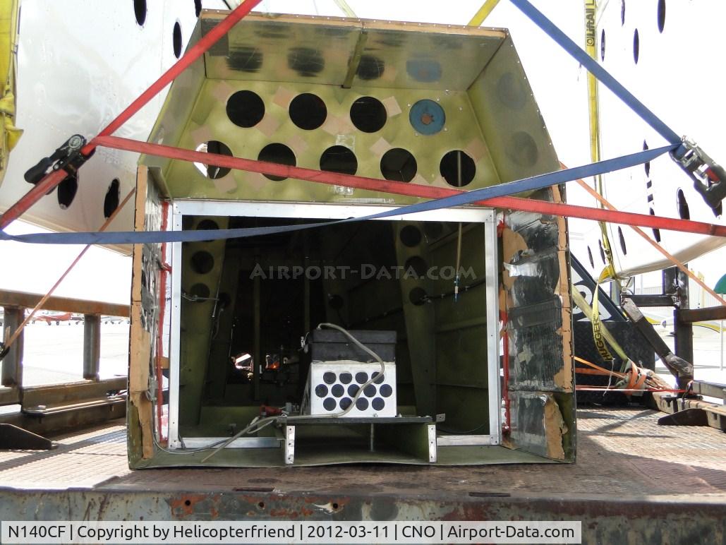 N140CF, Flaig Charles F DA4-B C/N 140, Appears to be the rear portion of the fuselage setting on a truck between the wings of N757HD
