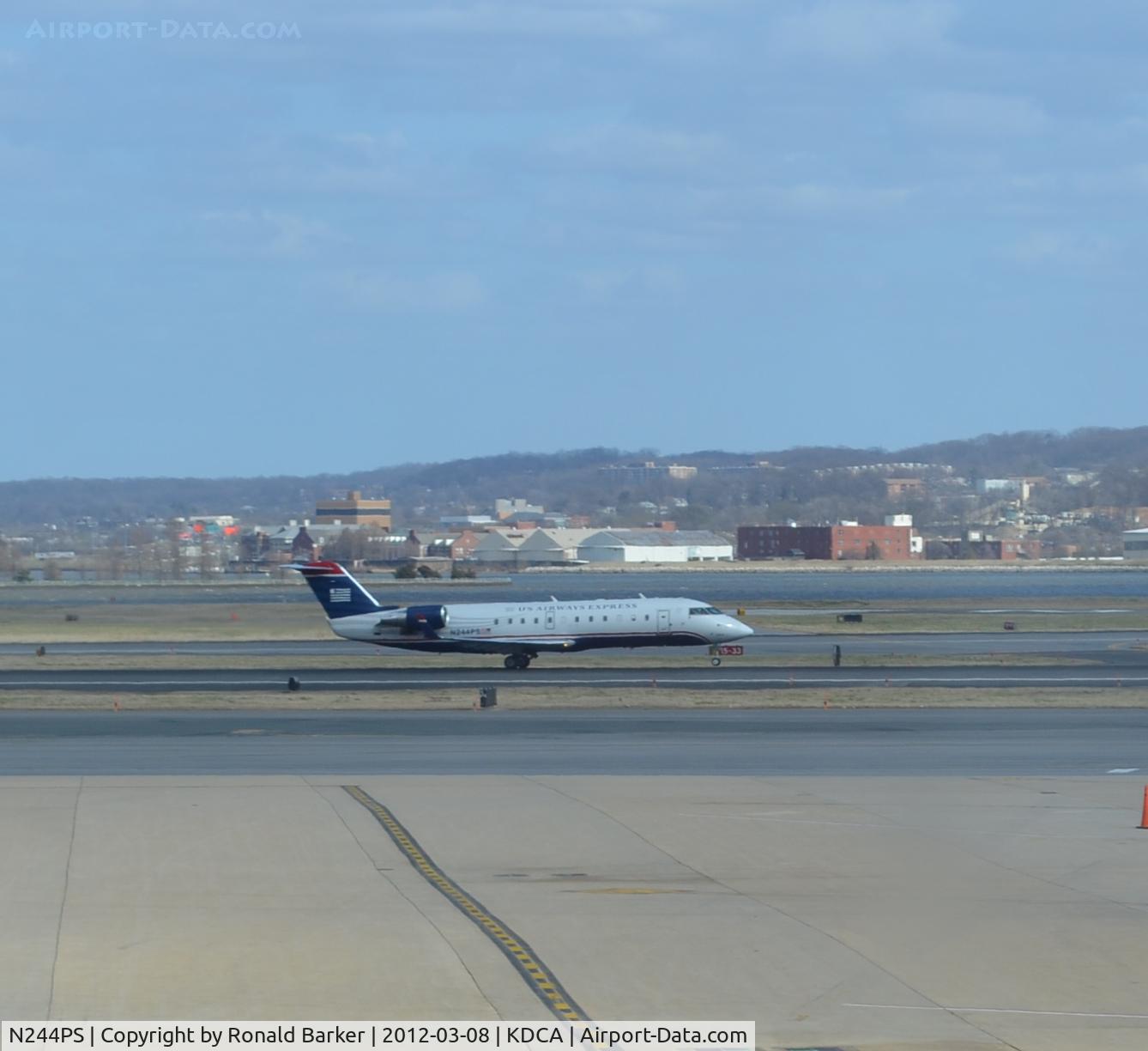 N244PS, 2004 Bombardier CRJ-200ER (CL-600-2B19) C/N 7912, Takeoff DCA