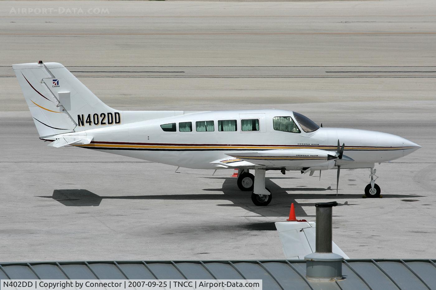 N402DD, 1976 Cessna 402B C/N 402B1048, Waiting in the hot sun of Curacao.