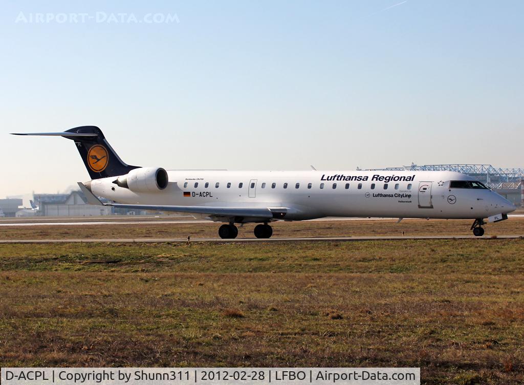 D-ACPL, 2002 Canadair CRJ-701ER (CL-600-2C10) Regional Jet C/N 10076, Taxiing holding point rwy 14L for departure...