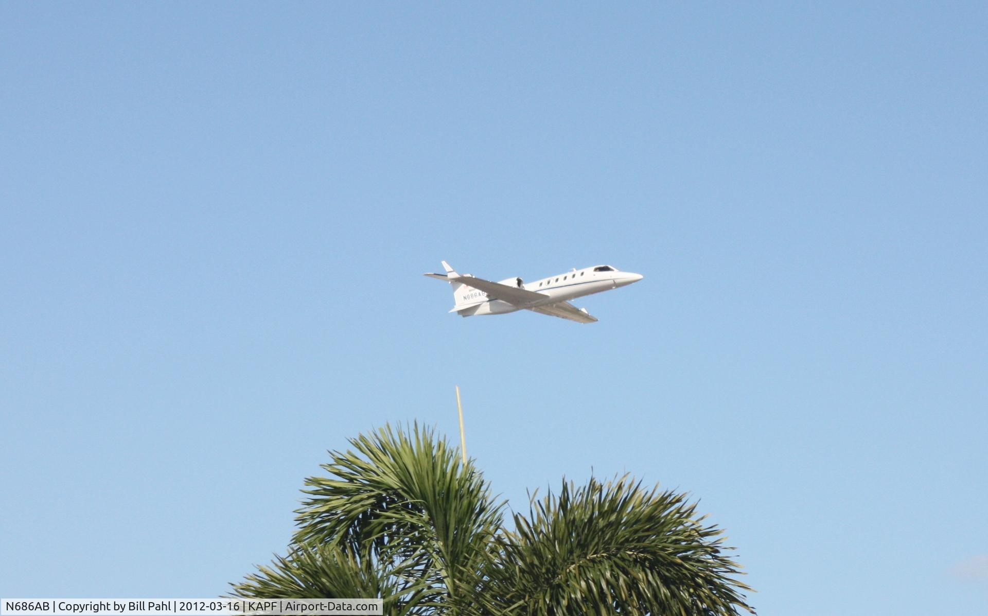 N686AB, 2002 Learjet Inc 31A C/N 239, Taking off from Naples Municipal Airport 3-16-12.(KAPF)
