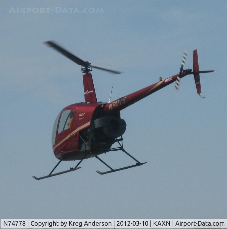N74778, 2005 Robinson R22 Beta C/N 3968, Robinson R22 Beta departing the ramp.