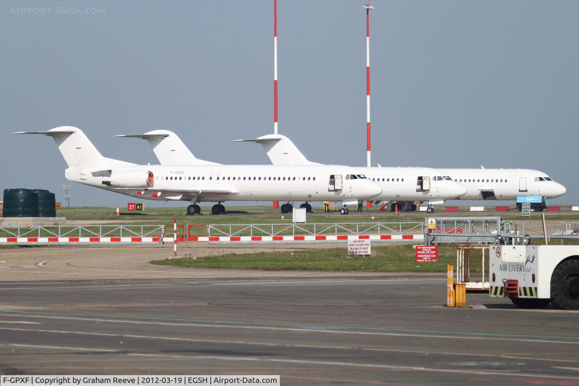 F-GPXF, 1991 Fokker 100 (F-28-0100) C/N 11330, Parked in the sun with other white tail F 100's.