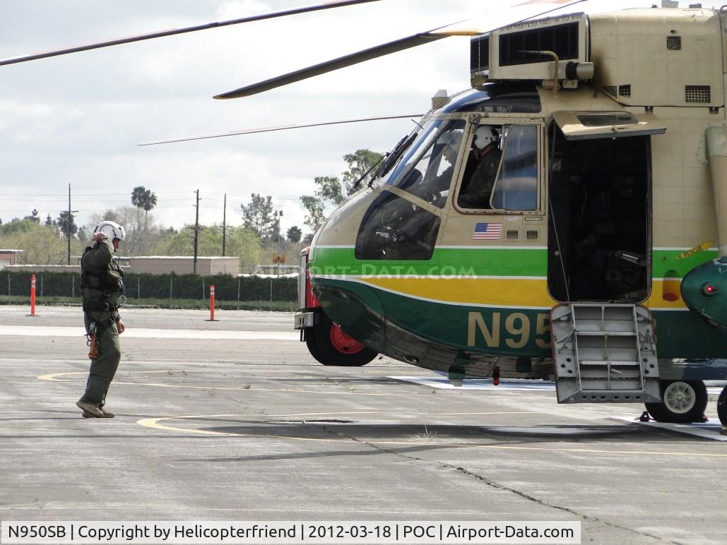 N950SB, Sikorsky SH-3H Sea King C/N 61372, Crewperson checking the immediate area of the ship before giving the signal to turn up the rotors
