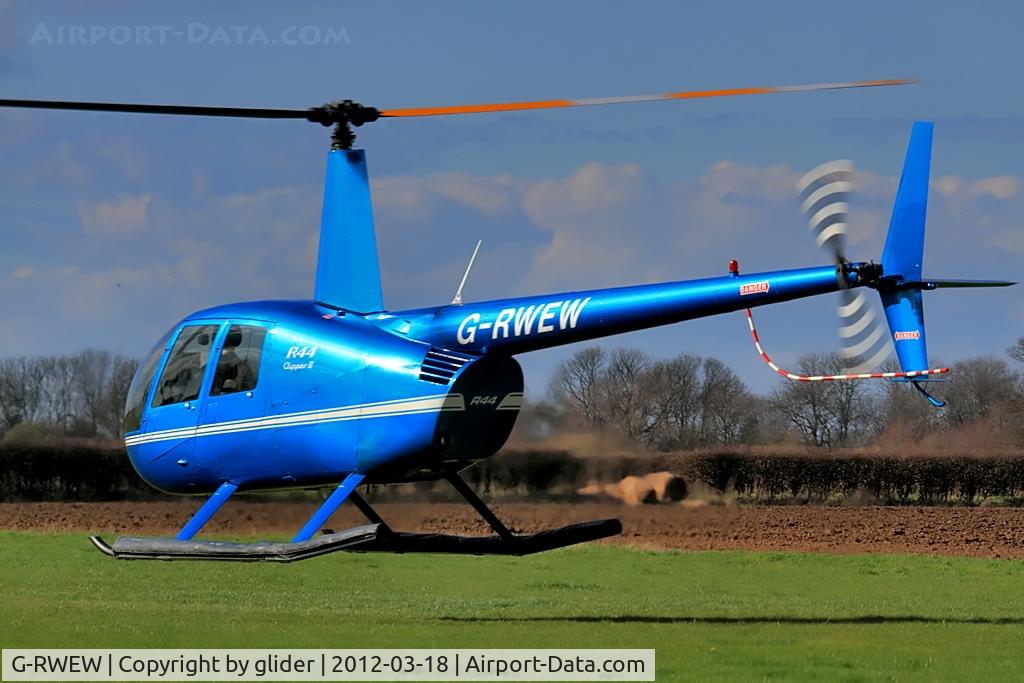 G-RWEW, 2006 Robinson R44 Clipper II C/N 11148, In the hover about to head off