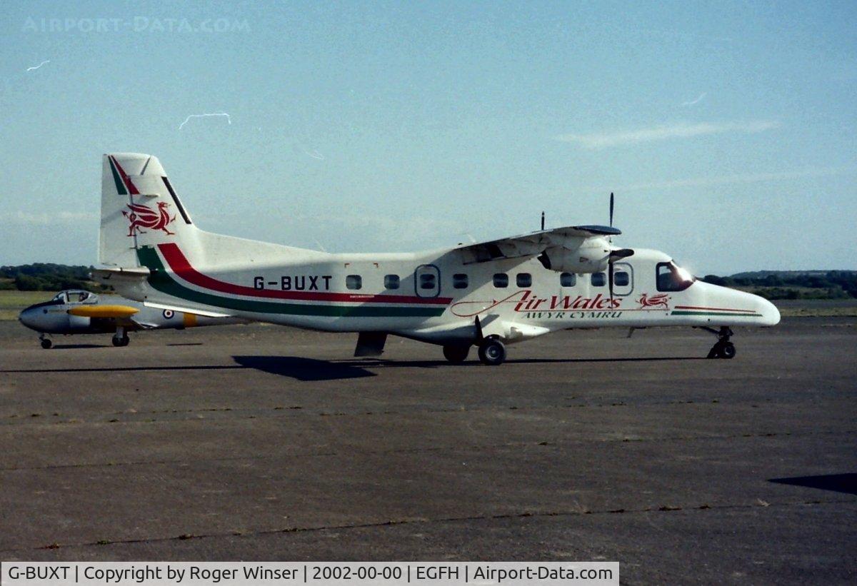 G-BUXT, 1986 Dornier 228-202K C/N 8065, One of two Air Wales Do 228's based at Swansea Airport. Summer 2002.