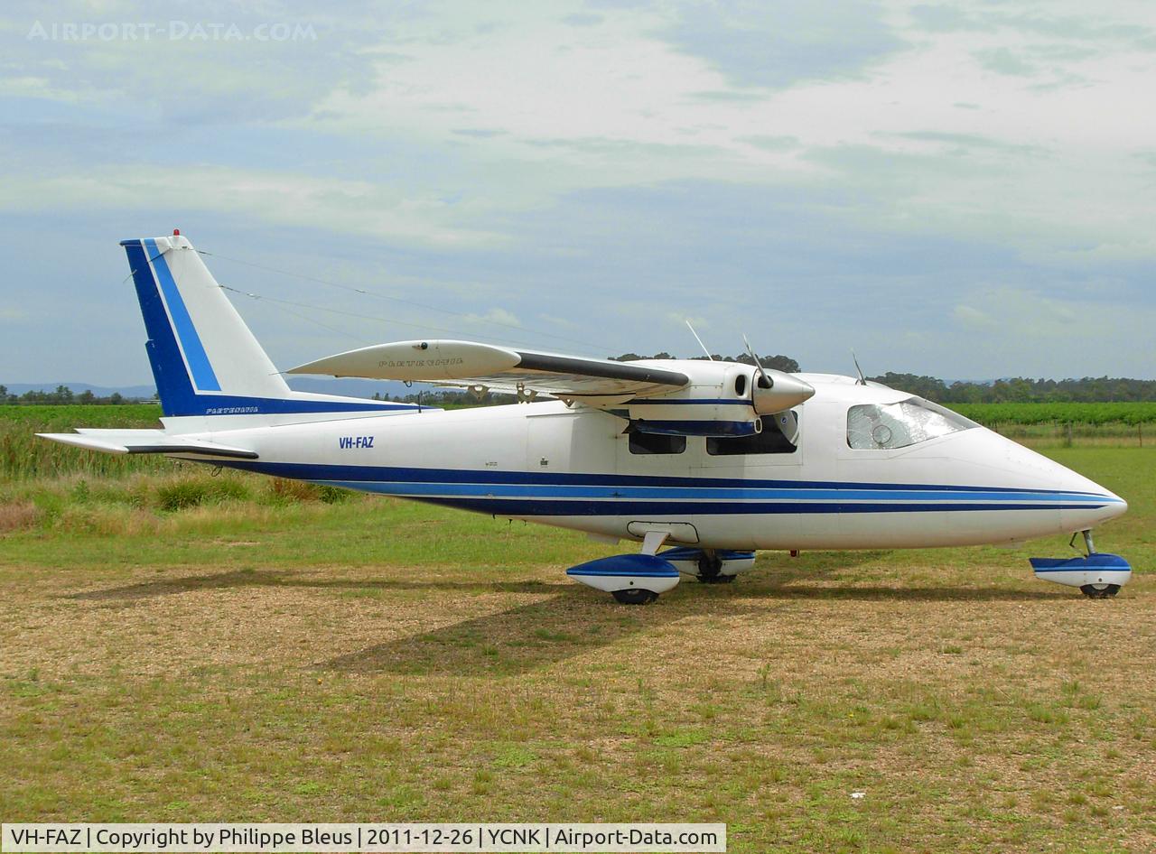VH-FAZ, 1975 Partenavia P-68B C/N 53, On the grass, on a quiet day.