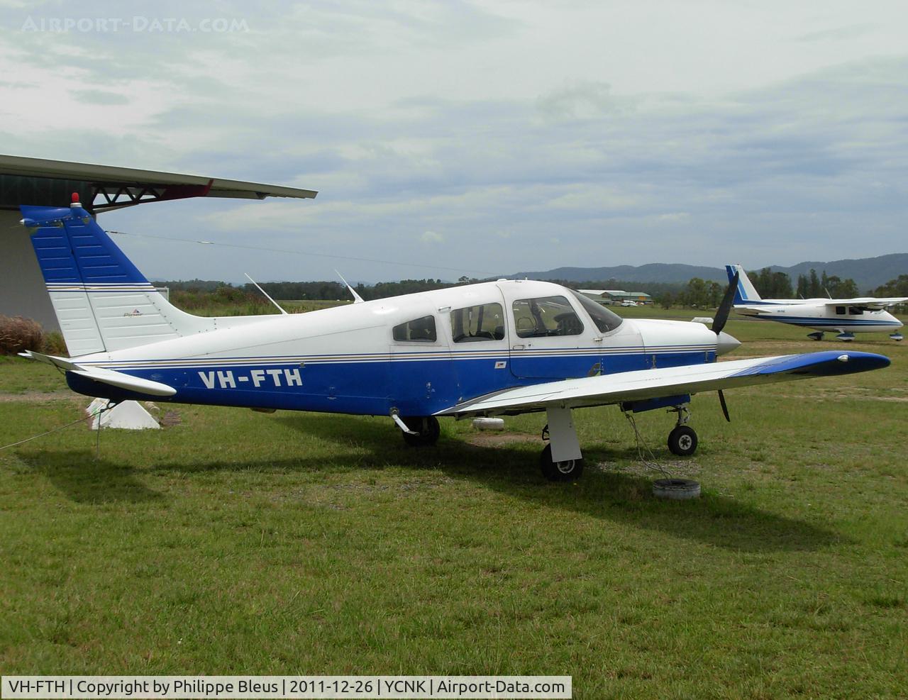 VH-FTH, 1978 Piper PA-28R-201 Cherokee Arrow III C/N 28R-7837092, Parked on the grass, quiet sleepy day.
