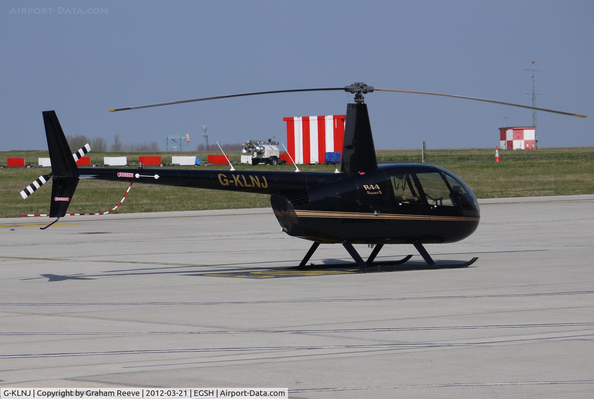G-KLNJ, 2008 Robinson R44 Raven II C/N 12508, Parked in the sun.