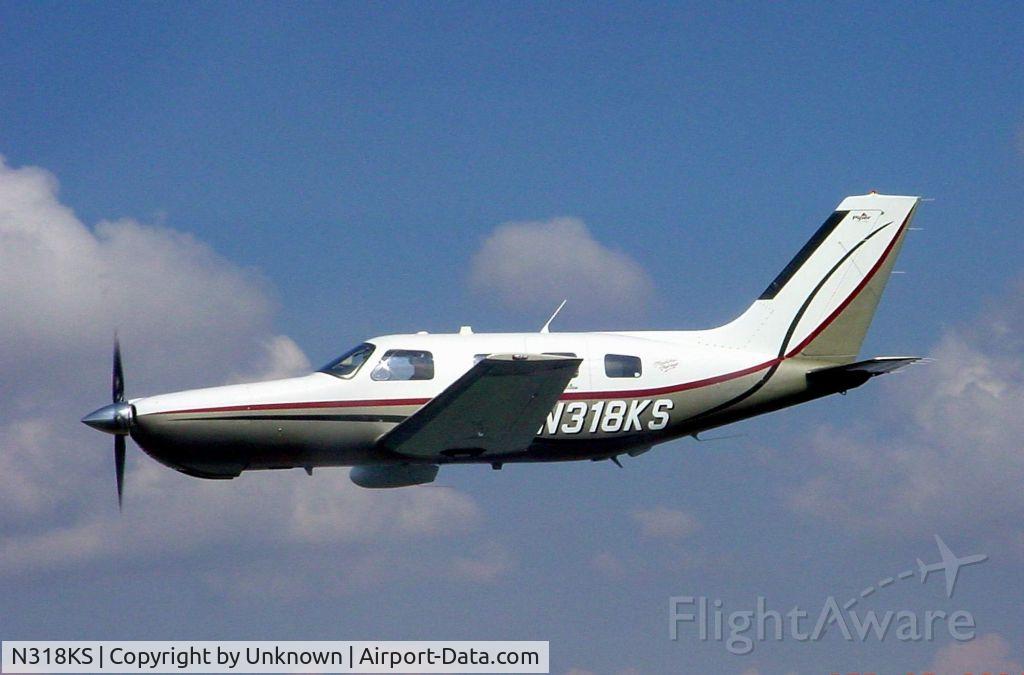 N318KS, 2003 Piper PA-46-350P Malibu Mirage C/N 4636347, Photo of N-318KS fly over