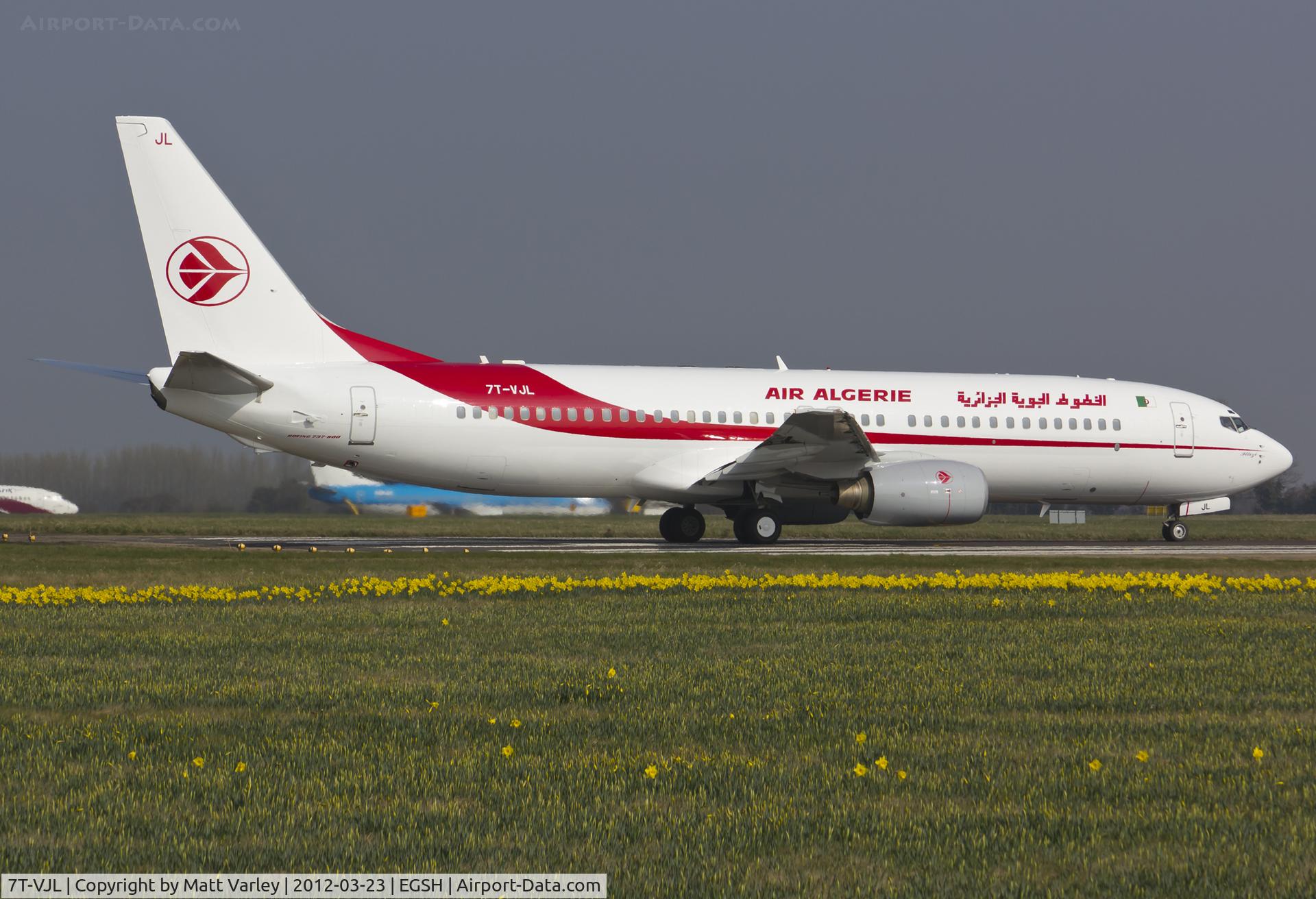 7T-VJL, 2000 Boeing 737-8D6 C/N 30204, Departing EGSH after spray by Air Livery.