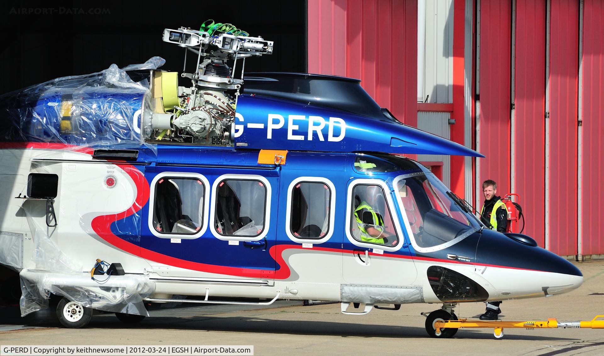 G-PERD, 2012 AgustaWestland AW-139 C/N 41270, Following unloading pushed into hangar
