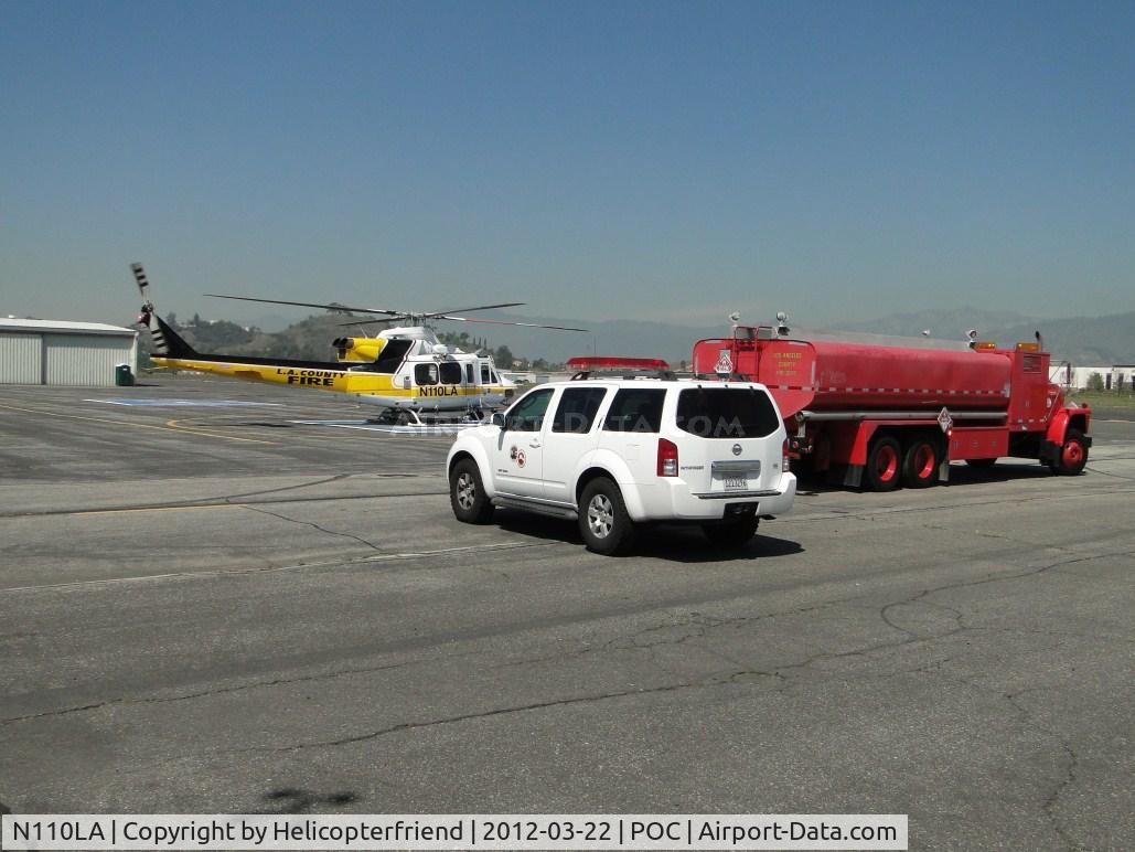 N110LA, 2005 Bell 412EP C/N 36392, Crewman drives up, Copter 11 starts up and off they go westbound