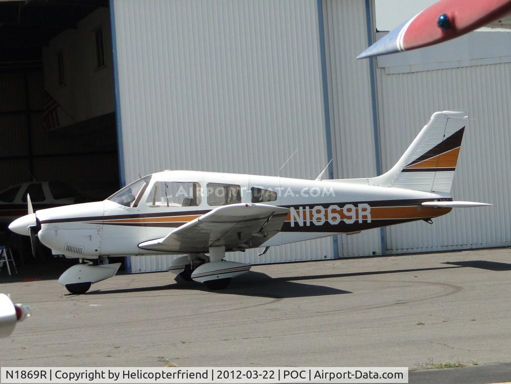 N1869R, 1975 Piper PA-28-181 C/N 28-7690060, Parked near Howard Aviation