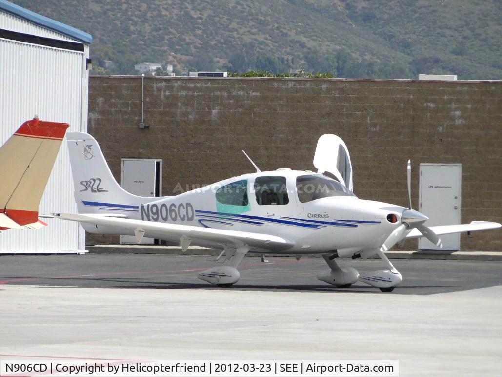 N906CD, 2003 Cirrus SR22 C/N 0523, Parked near a hanger with door open