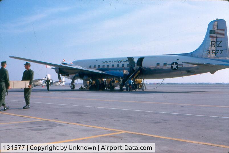131577, 1951 Douglas R6D-1 (DC-6A) C/N 43680, Members of Inshore Undersea Warfare Group 1 WestPacDet Unit 2 loading aircraft at Naval Air Station, Los Alamitos, Calif. as they deploy to Vietnam in December 1966.