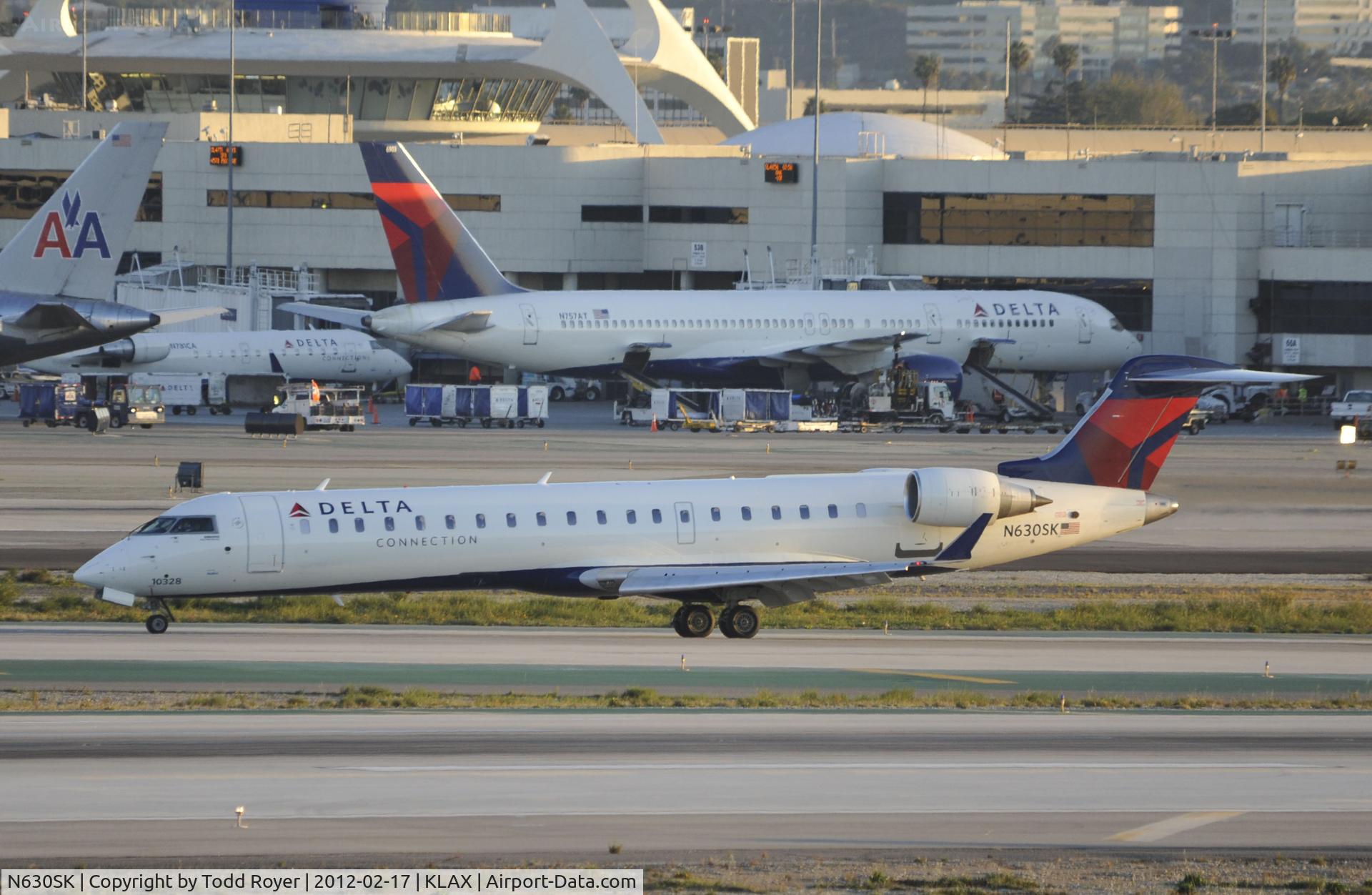 N630SK, 2011 Bombardier CRJ-700 (CL-600-2C10) Regional Jet C/N 10328, Taxiing to gat at LAX