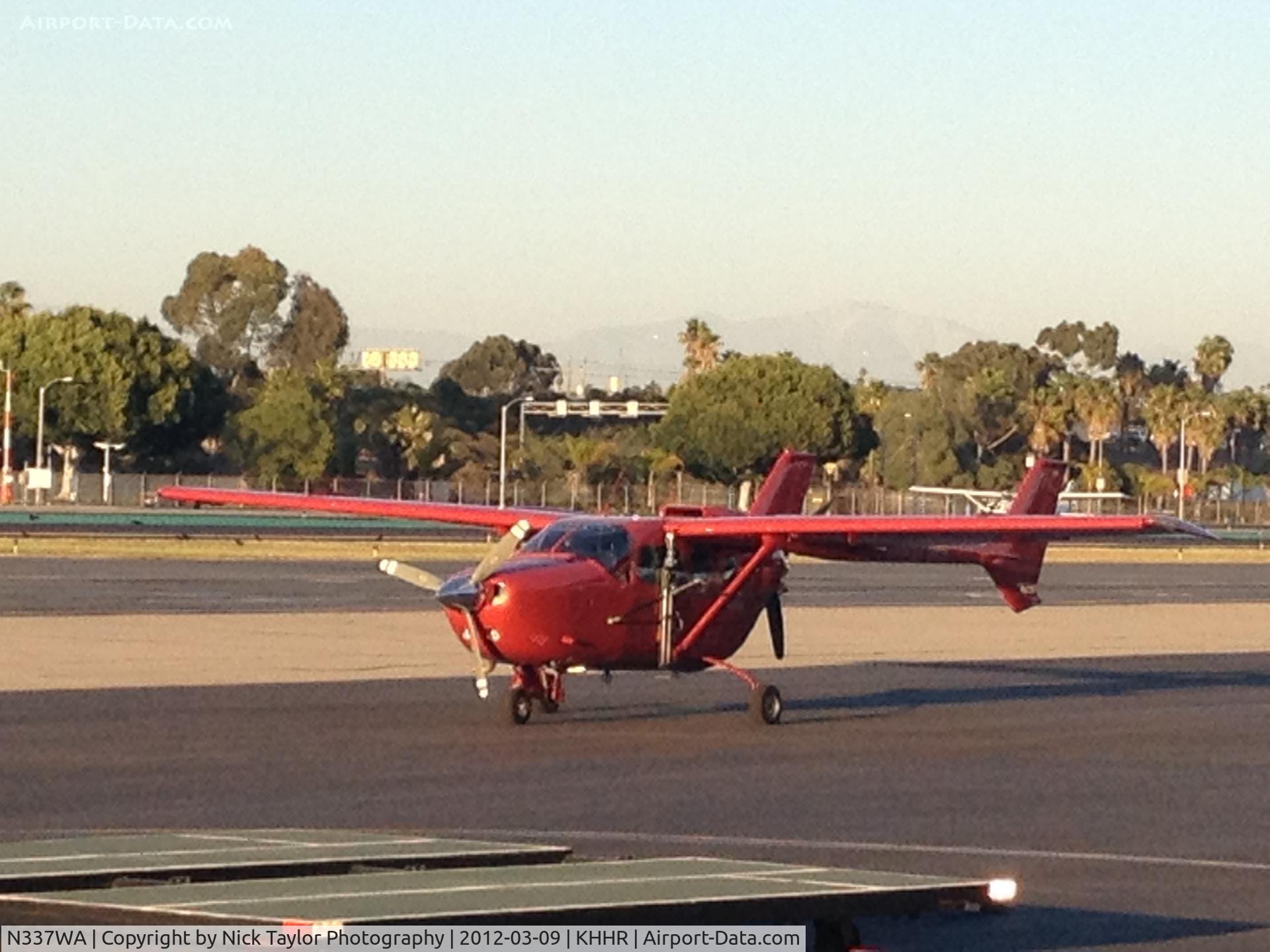 N337WA, 1975 Cessna 337G Super Skymaster C/N 33701651, Parked on the Wolfe Air ramp