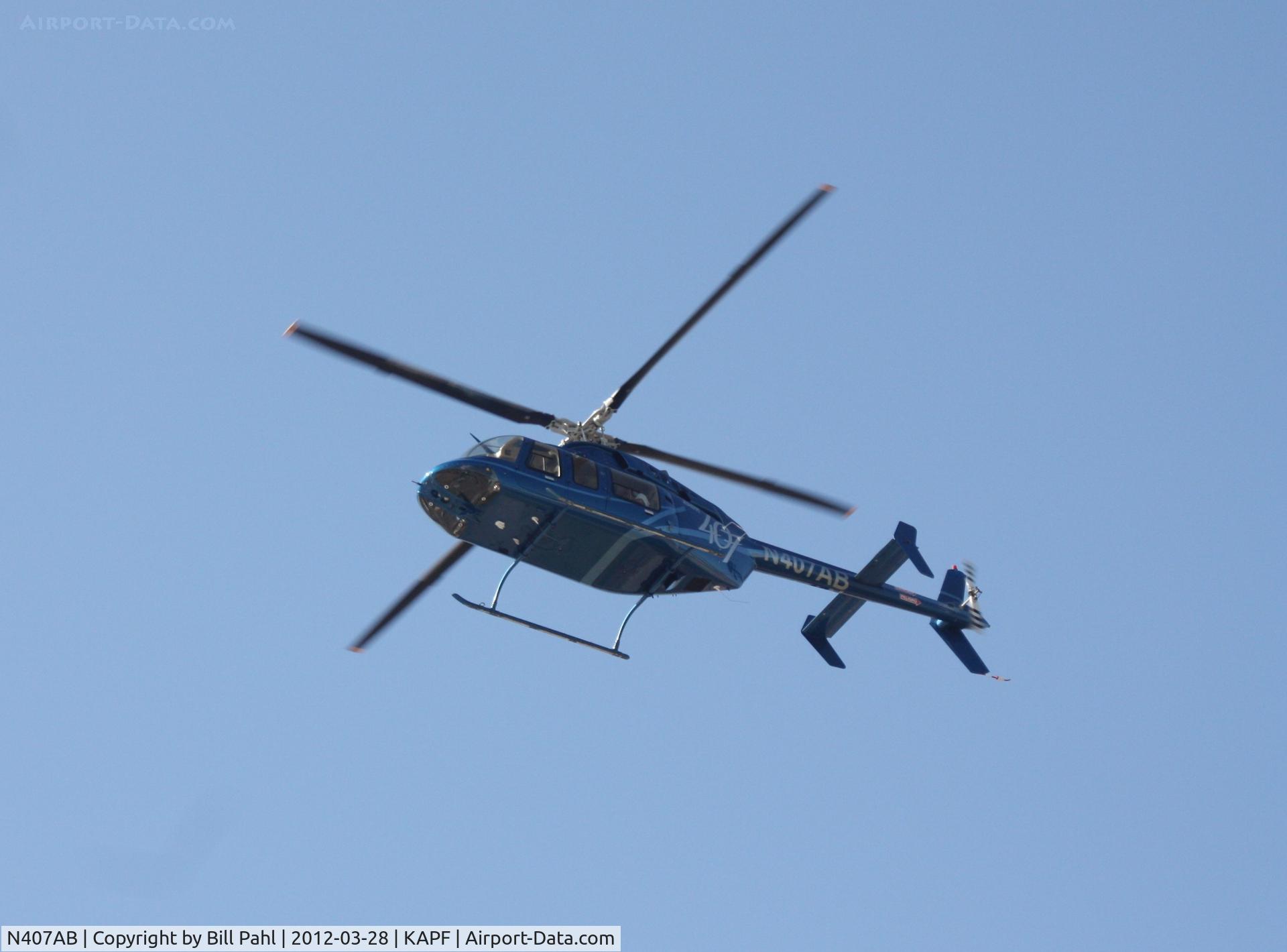 N407AB, 2005 Bell 407 C/N 53634, Shortly after lift-off from Naples Municipal
