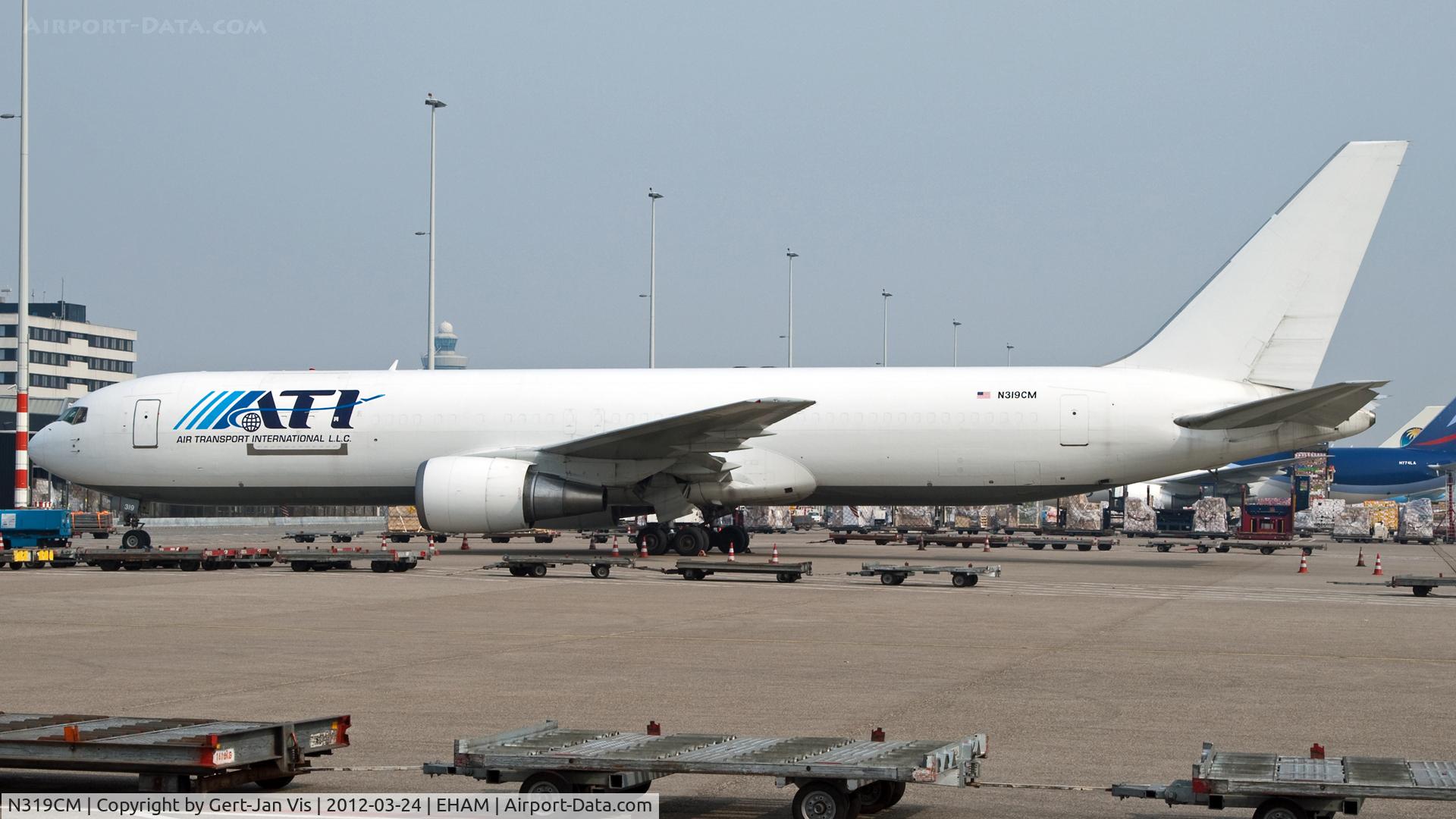 N319CM, 1988 Boeing 767-338 C/N 24407, Parked at the R-ramp at AMS