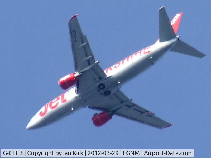 G-CELB, 1986 Boeing 737-377 C/N 23664, G-CELB on approach over Hunslet, Leeds, 7 miles south west of EGNM Leeds Bradford Airport. Jet Yorkshire livery. 18:00 BST