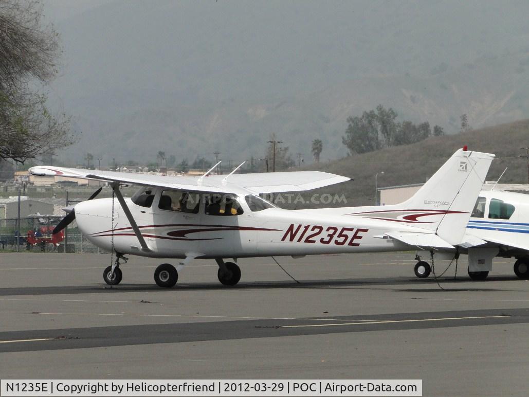 N1235E, 2005 Cessna 172S C/N 172S9847, Parked in transient parking