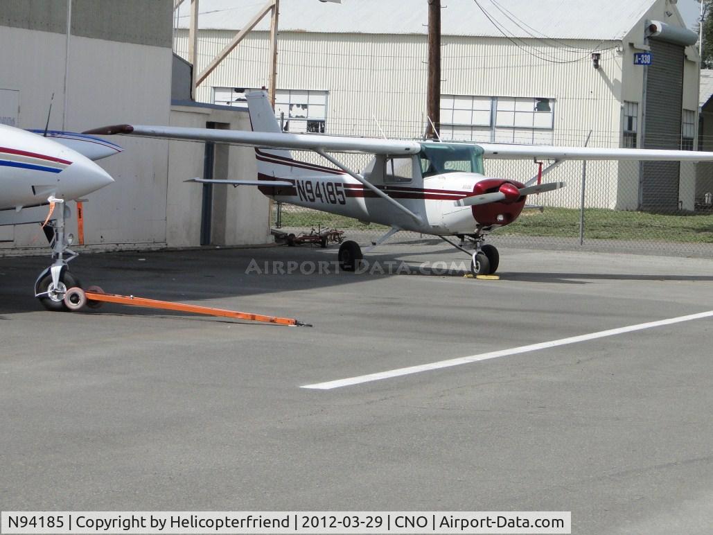 N94185, 1982 Cessna 152 C/N 152-85615, Parked in a corner next to the hanger
