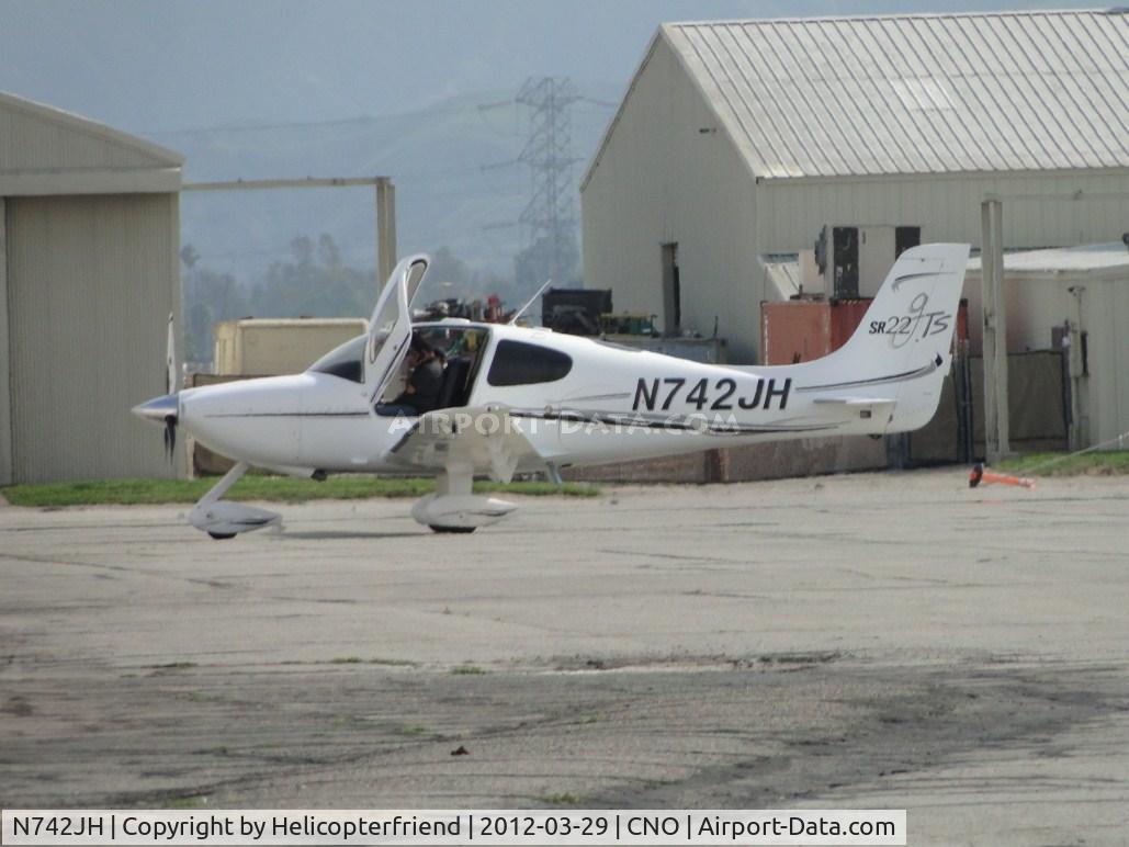 N742JH, 2006 Cirrus SR22 GTS C/N 1963, Just arrived at the hanger area, waiting to be put away