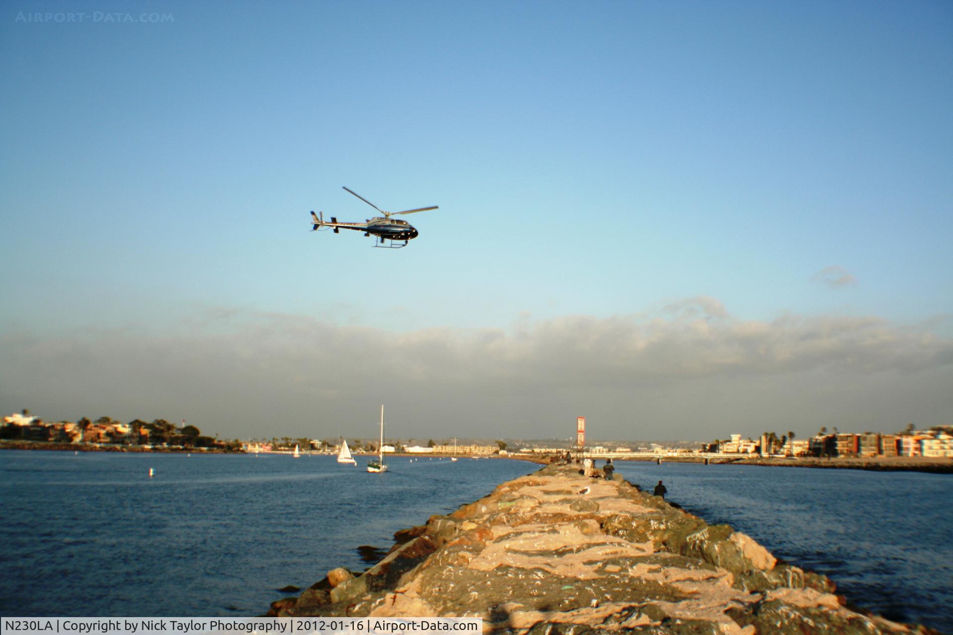 N230LA, 2000 Eurocopter AS-350B-2 Ecureuil Ecureuil C/N 3318, Passing over Marina Del Rey at low altitude