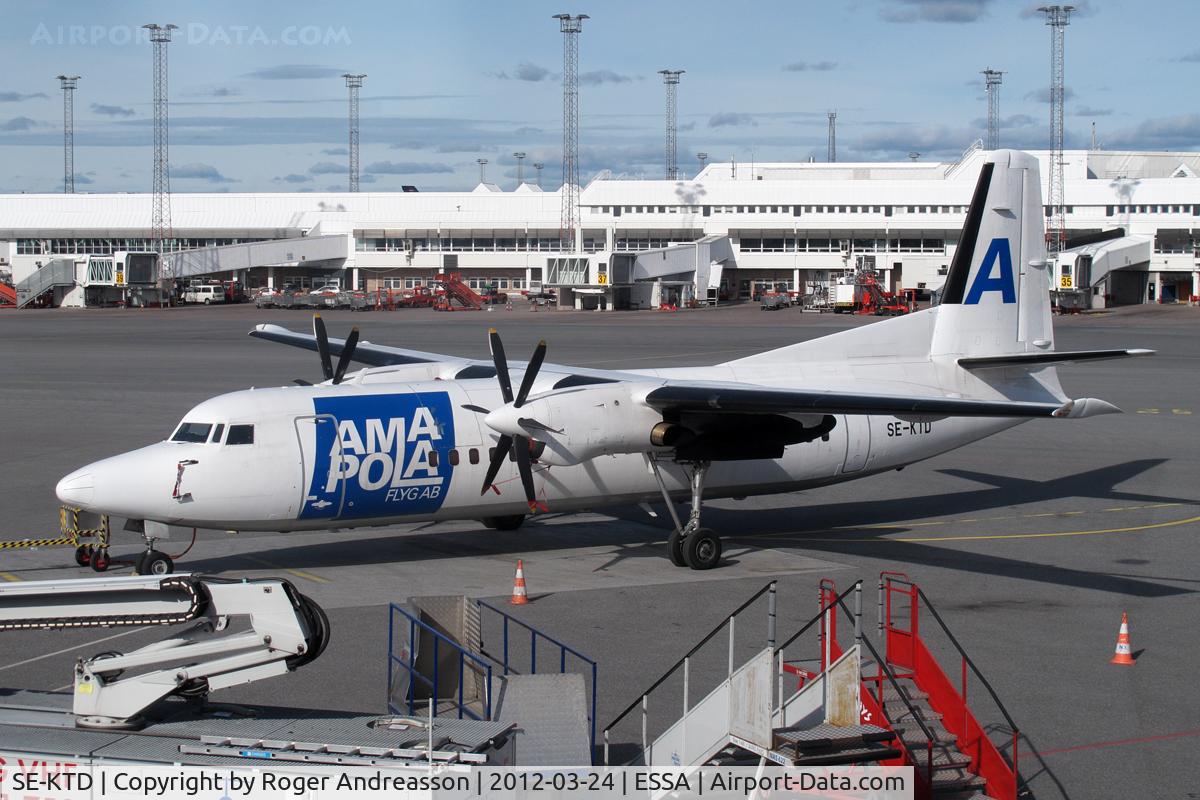 SE-KTD, 1988 Fokker 50 C/N 20125, Parked at terminal 3