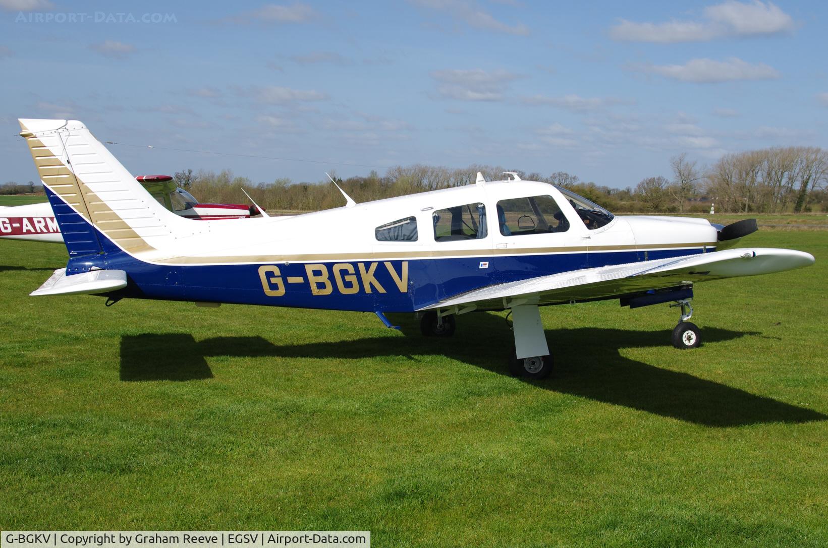 G-BGKV, 1977 Piper PA-28R-201 Cherokee Arrow III C/N 28R-7737156, Parked in the sun.