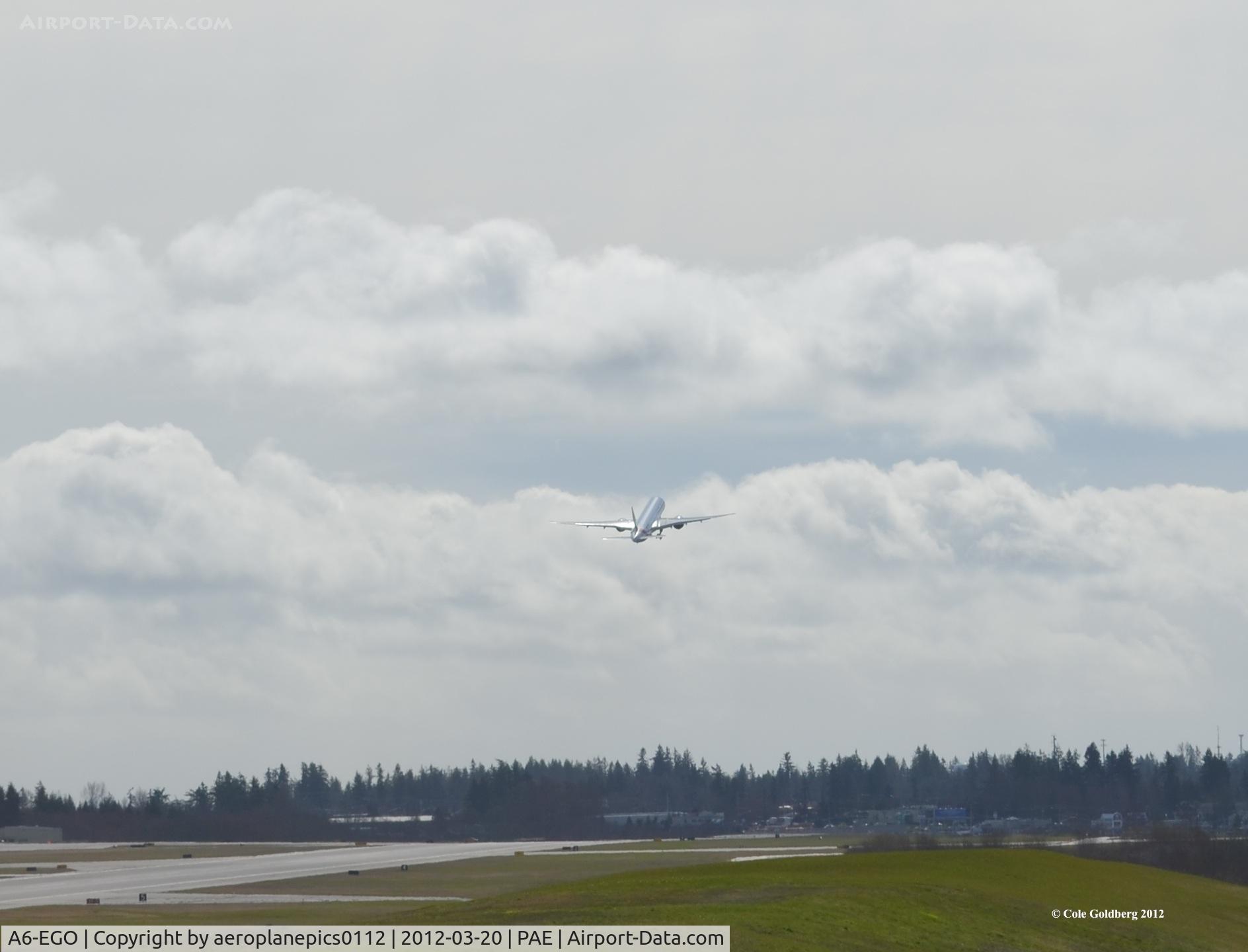 A6-EGO, 2012 Boeing 777-31H/ER C/N 35598, A6-EGO lifts off on a 14 hour flight to Dubai. It is fully loaded with 16 passengers, flying at 4.5% capacity!
