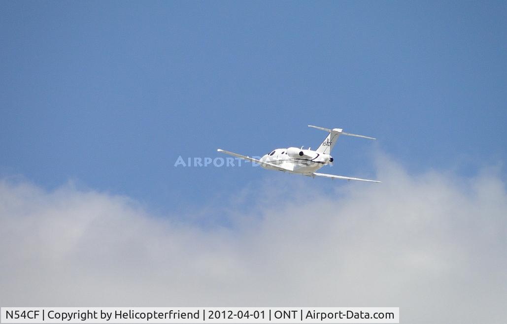 N54CF, 2009 Cessna 510 Citation Mustang Citation Mustang C/N 510-0253, Departing 26L and heading towards the clouds